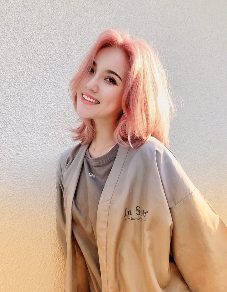 Soft pink shoulder-length cut in an InStyle robe